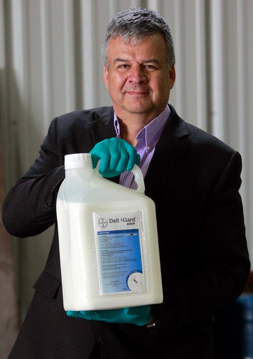 BORIS MINKEVICH / WINNIPEG FREE PRESS
City press conference on the update on insect control activities at Insect Control Branch Heliport  620 Tyne Avenue (3 Grey Street). Superintendent of Insect Control
Ken Nawolsky holds a bottle of DeltaGard 20EW. This is what will be used to fog for mosquitos this year in Winnipeg. DeltaGard 20EW is an insecticide that is newly registered for use in Canada for wide area mosquito control. It belongs to the pyrethroid family. Pyrethroids are the man-made versions of pyrethrins, natural insecticides from chrysanthemum flowers. As a class, pyrethroids are the most widely-used insecticides for controlling adult mosquitoes by professionals in the world.(from Bayer website). NICHOLAS FREW STORY. April 27, 2018