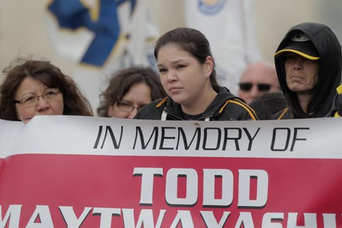RUTH BONNEVILLE / WINNIPEG FREE PRESS


Family and community members from RED EAGLE-MISSKWA KINEW held a sign in memory of TODD MAYTWAYASHING, 22-year-old man who died while working on a hydro project in northern Manitoba at ground breaking ceremony for workers memorial Friday. 
  

A formal ground breaking ceremony was held at Memorial Park with Kevin Rebeck, Manitoba Federation of Labour President, Minister Blaine Pedersen and other political and civil leaders on Friday.  


More info on Maytwayashing :
Todd Maytwayashing, of Lake Manitoba First Nation, had been working at a hydro storage yard approximately 800 kilometres north of Winnipeg at the time of his death. 
Maytwayashing was working for Forbes Bros., a contracting company employed by Manitoba Hydro to build a transmission line from the Keeyask generating station to a nearby station.

Barry Swan, Maytwayashings father, said his son was helping load steel beams onto a semi-truck when one of the beams fell and landed on his head.
That was Jan. 17  and the family has yet to hear from Manitoba Hydro.

See Jane Gerster story.  

April 27,  2018
