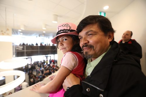 RUTH BONNEVILLE / WINNIPEG FREE PRESS

Five-year-old Maya Contreras and her dad Reinalda Contreras look down at the crowds of people that gathered to attend the grand opening of Merchants Corner on Selkirk Ave. Saturday.  Her dad graduated from the urban inner city studies at University of Winnipeg which is now located at Merchants corner.  

See Jessica Botelho-Urbanski story 


April 28,  2018
