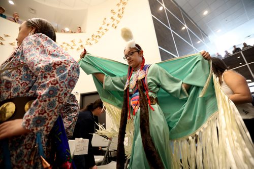 RUTH BONNEVILLE / WINNIPEG FREE PRESS

Walking Wolf Singers and Dancers dance their way into the crowded foyer of  Merchants Corner on Selkirk Ave. Saturday during their opening day celebrations Saturday.  
See Jessica Botelho-Urbanski story 


April 28,  2018
