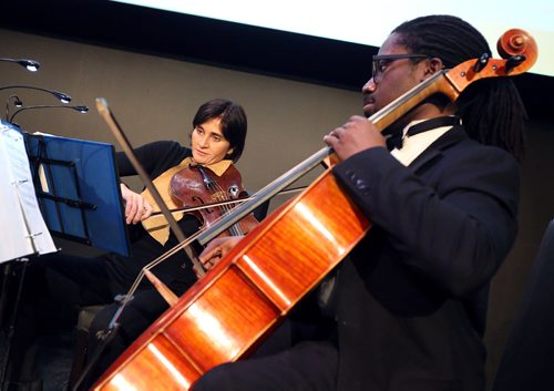 JASON HALSTEAD / WINNIPEG FREE PRESS

L-R: Armadillo String Quartet violist Nancy Enns and cellist Bery Filsaime perform at Pairings With Pulford, a fundraising event for Pulford Community Living Services at the Metropolitan Entertainment Centre on April 6, 2018. (See Social Page)