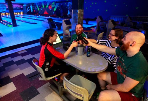 BORIS MINKEVICH / WINNIPEG FREE PRESS
Today was the last day Academy Lanes bowling alley was open. From left, Grace Romund, Micheal OHanlon, Laura Lazarenko, and Ross McKernan enjoy the lanes for the last time. ALEXANDRA PAUL STORY. April 29, 2018