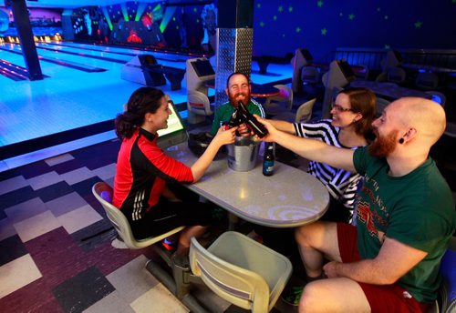 BORIS MINKEVICH / WINNIPEG FREE PRESS
Today was the last day Academy Lanes bowling alley was open. From left, Grace Romund, Micheal OHanlon, Laura Lazarenko, and Ross McKernan enjoy the lanes for the last time. ALEXANDRA PAUL STORY. April 29, 2018