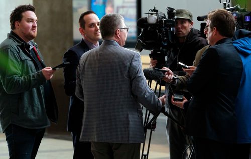 BORIS MINKEVICH / WINNIPEG FREE PRESS
Manitoba Hydro President and CEO Kelvin Shepherd, centre, in media scrum in the atrium of Manitoba Hydro Place downtown(Hydro HQ). LARRY KUSCH STORY  May 1, 2018
