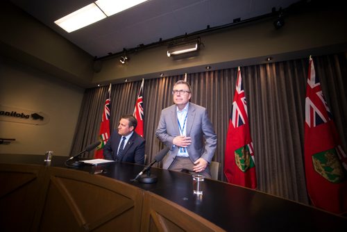 MIKAELA MACKENZIE / WINNIPEG FREE PRESS
Crown Services Minister Cliff Cullen (left) and CEO of Manitoba Hydro Kelvin Shepherd walk up to speak to the media about the PUB decision on Manitoba Hydro electricity rates at the Manitoba Legislative Building in Winnipeg on Tuesday, May 1, 2018.
Mikaela MacKenzie / Winnipeg Free Press 2018.