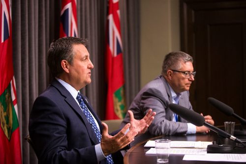 MIKAELA MACKENZIE / WINNIPEG FREE PRESS
Crown Services Minister Cliff Cullen (left) and CEO of Manitoba Hydro Kelvin Shepherd speak to the media about the PUB decision on Manitoba Hydro electricity rates at the Manitoba Legislative Building in Winnipeg on Tuesday, May 1, 2018.
Mikaela MacKenzie / Winnipeg Free Press 2018.