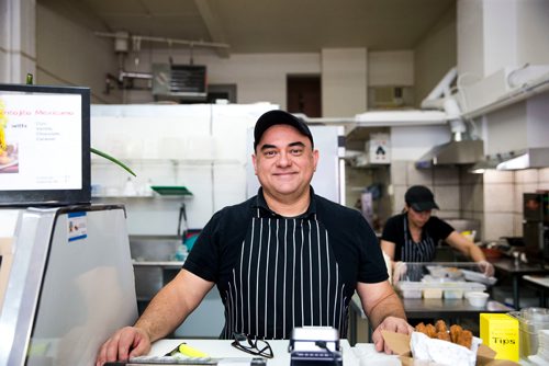 MIKAELA MACKENZIE / WINNIPEG FREE PRESS
Owner and "antojitos expert" Carlos Bosque at the Sargent Taco Shop in Winnipeg on Tuesday, May 1, 2018. The shop makes authentic Mexican takeout food.
Mikaela MacKenzie / Winnipeg Free Press 2018.