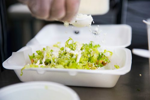 MIKAELA MACKENZIE / WINNIPEG FREE PRESS
Owner and "antojitos expert" Carlos Bosque makes flautas at the Sargent Taco Shop in Winnipeg on Tuesday, May 1, 2018. The shop makes authentic Mexican takeout food.
Mikaela MacKenzie / Winnipeg Free Press 2018.