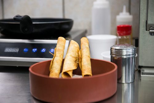 MIKAELA MACKENZIE / WINNIPEG FREE PRESS
Flautas wait to be garnished at the Sargent Taco Shop in Winnipeg on Tuesday, May 1, 2018. The shop makes authentic Mexican takeout food.
Mikaela MacKenzie / Winnipeg Free Press 2018.