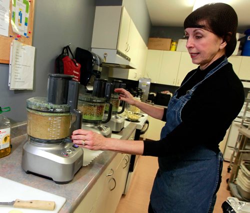 BORIS MINKEVICH / WINNIPEG FREE PRESS
INTERSECTION - Mary MacLean runs a business called Happy Dance Hummus. Here she blends up the product. May 13 is International Hummus Day. MacLean is a school teacher who launched her own hummus business three years ago. Photo taken at 851 Panet Road where her commercial kitchen is located. DAVE SANDERSON STORY May 1, 2018
