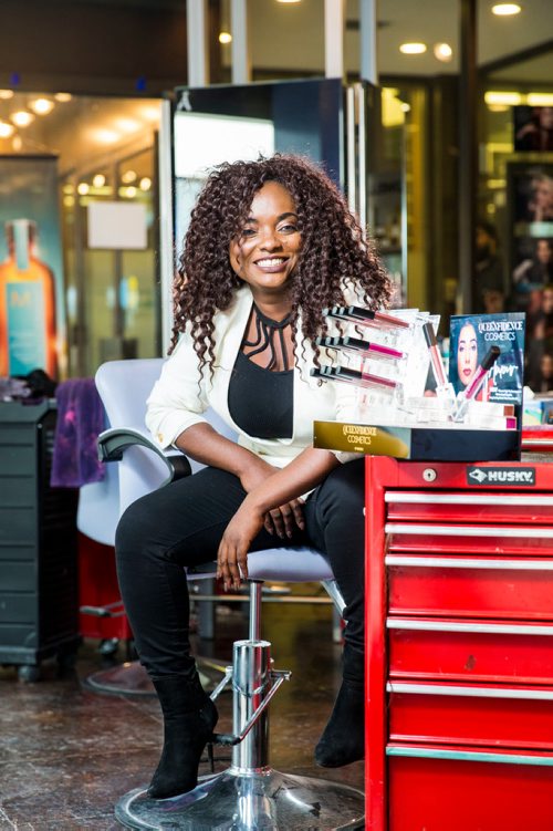 MIKAELA MACKENZIE / WINNIPEG FREE PRESS
Francine Bahati founder of Queenfidence, a new cosmetic line, poses at Ambience Hair Salon (where her products are sold) in Winnipeg on Tuesday, May 1, 2018. Francine fled the Congo at age 10 and spent years in Uganda, living in a one-room apartment with her large family, where she made her own makeup with palm oil and whatever else she could find. Her family came to Winnipeg four years ago and in December 2017 she launched Queenfidence. 
Mikaela MacKenzie / Winnipeg Free Press 2018.