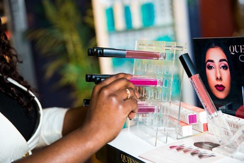 MIKAELA MACKENZIE / WINNIPEG FREE PRESS
Francine Bahati founder of Queenfidence, a new cosmetic line, poses at Ambience Hair Salon (where her products are sold) in Winnipeg on Tuesday, May 1, 2018. Francine fled the Congo at age 10 and spent years in Uganda, living in a one-room apartment with her large family, where she made her own makeup with palm oil and whatever else she could find. Her family came to Winnipeg four years ago and in December 2017 she launched Queenfidence. 
Mikaela MacKenzie / Winnipeg Free Press 2018.