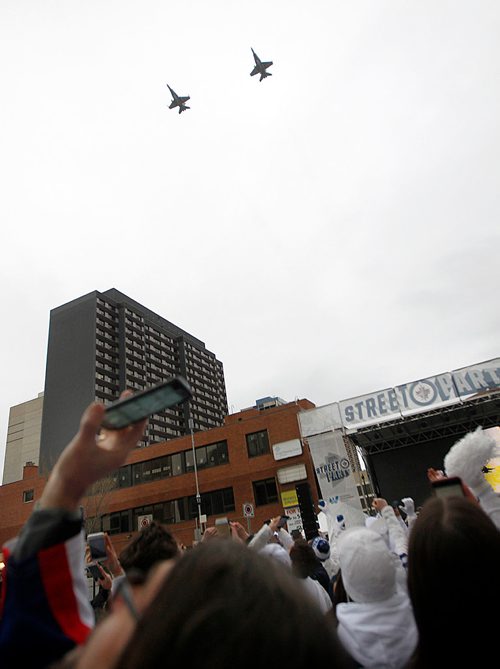 PHIL HOSSACK / WINNIPEG FREE PRESS - STREET PARTY - A pair of CF18 Hornet's buzz the crowd at the Jets Whiteout Party Tuesday.   Jessica's story.  - May 1, 2018