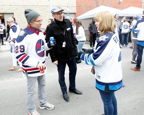 PHIL HOSSACK / WINNIPEG FREE PRESS - STREET PARTY - True North's Kevin Donnelly got out from behind the desk to mingle at the Jets Whiteout Party Tuesday.   Jessica's story.  - May 1, 2018