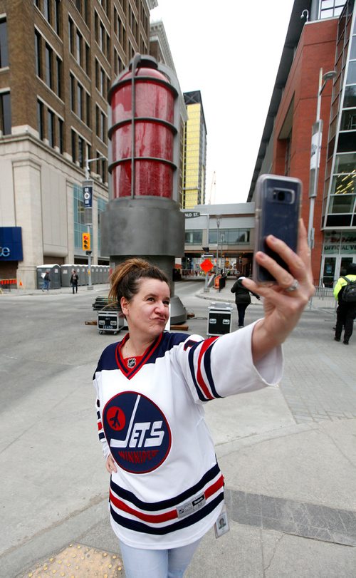 PHIL HOSSACK / WINNIPEG FREE PRESS - STREET PARTY - Valery Grant got into her selfie at Donald and Graham early before the Jets Whiteout Party Tuesday.   Jessica's story.  - May 1, 2018