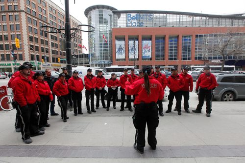 PHIL HOSSACK / WINNIPEG FREE PRESS - STREET PARTY - Downtown Biz patrollers are briefed by their supervisor Michelle Kindrat prior to the Jets Whiteout Party Tuesday.   Jessica's story.  - May 1, 2018