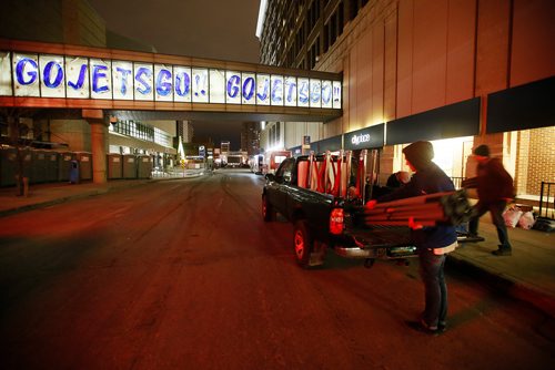 John Woods/Winnipeg Free Press
Crews clean up after the Winnipeg Jets' white out playoff party in downtown Winnipeg, Tuesday, May 1, 2018. 
