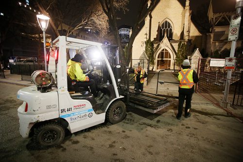 John Woods/Winnipeg Free Press
Crews clean up after the Winnipeg Jets' white out playoff party in downtown Winnipeg, Tuesday, May 1, 2018. 
