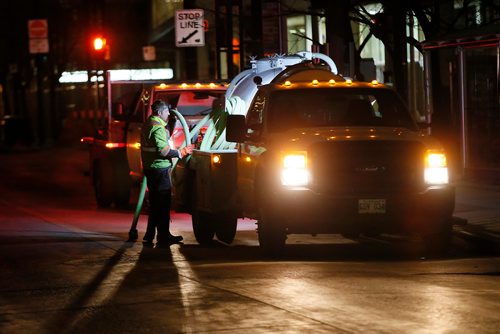 John Woods/Winnipeg Free Press
Crews clean up after the Winnipeg Jets' white out playoff party in downtown Winnipeg, Tuesday, May 1, 2018. 
