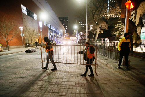 John Woods/Winnipeg Free Press
Crews clean up after the Winnipeg Jets' white out playoff party in downtown Winnipeg, Tuesday, May 1, 2018. 
