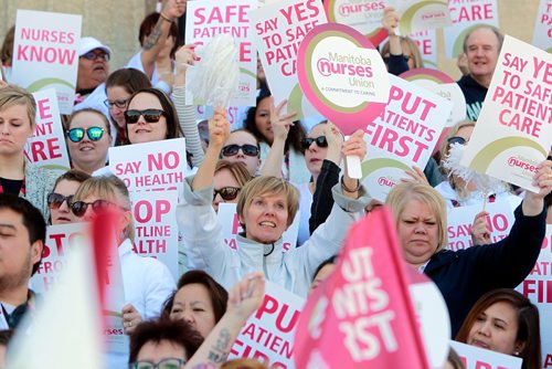 BORIS MINKEVICH / WINNIPEG FREE PRESS
Around 700 nurses and supporters converged on to the steps of the Manitoba Legislature today to protest against healthcare cuts. JANE GERSTER STORY.  May 2, 2018