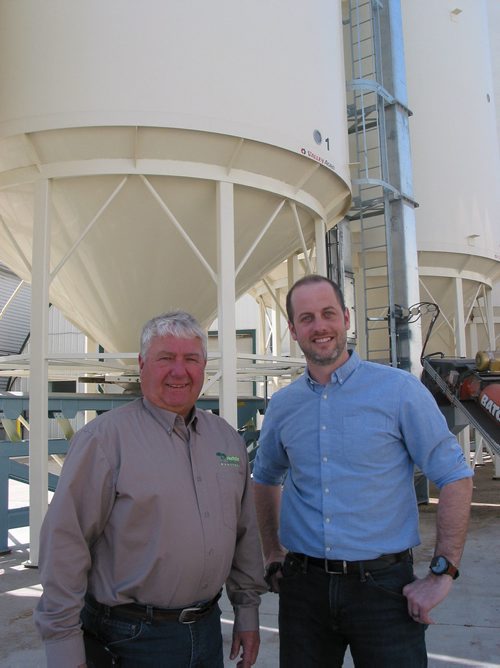 Canstar Community News April 23, 2018 - (From left) Pitura Seeds owners Calvin Pitura and Tom Greaves stand next to the bulk seed bins on the company's site south of Domain. (ANDREA GEARY/CANSTAR COMMUNITY NEWS)