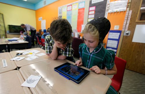 PHIL HOSSACK / WINNIPEG FREE PRESS - Crystal Springs elementary students research a project on an iPad in Ian Kleinsasser's computer equiped classroom Wednesday.  Bill Redekop's story.  - May 2, 2018