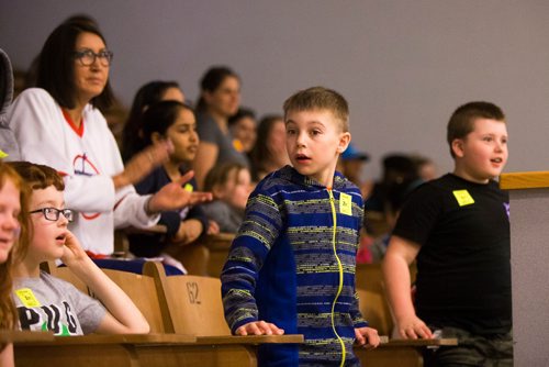 MIKAELA MACKENZIE / WINNIPEG FREE 
Not Bursak, a grade three student, watches a "potions class" at Discovery Days at the University of Manitoba in Winnipeg on Thursday, May 3, 2018. 
Mikaela MacKenzie / Winnipeg Free Press 2018.