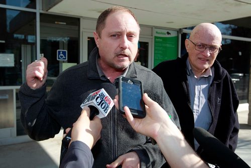 BORIS MINKEVICH / WINNIPEG FREE PRESS
A guilty verdict was handed down to James Aisaican-Chase, right, at courts this morning (373 Broadway). Red light camera case. Todd Dube, founder of Wise Up Winnipeg, left, talks to the media shortly after the ruling. RYAN THORPE STORY.  May 4, 2018