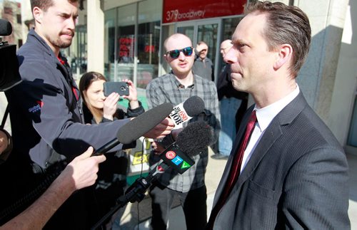 BORIS MINKEVICH / WINNIPEG FREE PRESS
A guilty verdict was handed down to James Aisaican-Chase at courts this morning (373 Broadway). Red light camera case. In photo, Lawyer Mark Toews, right, talked to the media shortly after the ruling. RYAN THORPE STORY.  May 4, 2018