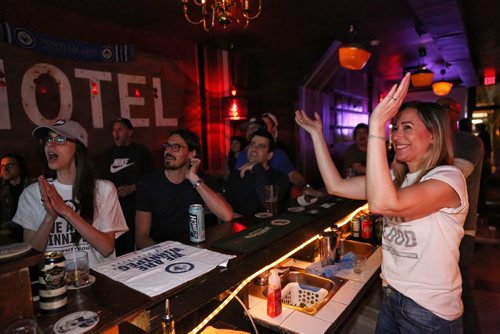 MIKE DEAL / WINNIPEG FREE PRESS
Lisa Black reacts while catching parts of the Jets playoff game against the Nashville Predators in the bar Motel which she runs with her husband Danny Greaves. 
Thursday, May 3, 2018.