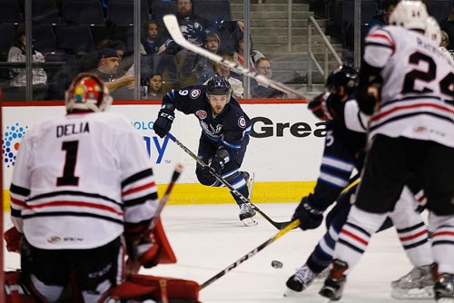 PHIL HOSSACK / WINNIPEG FREE PRESS - Manitoba Moose #9 Chase De Leo fires the puck across the crease at the Rockford Icehog net Friday evening at the Bell MTS Place.  - May 4, 2018