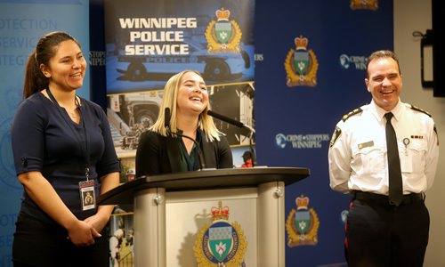 TREVOR HAGAN / WINNIPEG FREE PRESS
Hope Scott, 25, and Nadia Ritchie, participants in the their Future Women in Law Enforcement event, speaking to media as Winnipeg Police Chief Danny Smyth looks on, at Police Headquarters, Saturday, May 5, 2018.