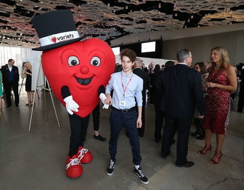 JASON HALSTEAD / WINNIPEG FREE PRESS

Variety volunteer Ty Sedor with Variety mascot Heartly at Variety's 2018 Gold Heart Gala at the RBC Convention Centre Winnipeg on April 14, 2018. (See Social Page)