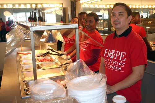 SUBMITTED PHOTO

OPE volunteers serve up food as the Winnipeg Chapter of HOPE Worldwide Canada hosted a fundraising event on April 14, 2018 at Canton Buffet. (See Social Page)