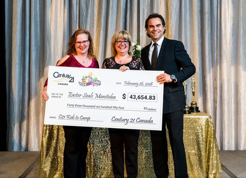 SUBMITTED PHOTO

L-R: SMD Foundation staff members, Diana Simpson and COO Maria Marrone receive a donation from Martin Charlwood (vice-chairman and CEO, Century 21 Canada) at the Century 21 Gold Gala and Awards on Feb. 26, 2018 at the Fairmont Winnipeg. (See Social Page)