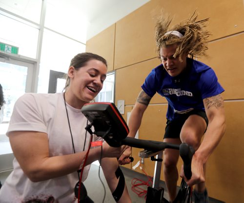 TREVOR HAGAN / WINNIPEG FREE PRESS
Kaitlin Kucharski, a technical team member, monitoring the progress of Kayden Johnson, one of 100 athletes from qualifying events in Saskatoon, Brandon and Winnipeg participated in the RBC Training Ground at the University of Winnipeg, Saturday, May 5, 2018.