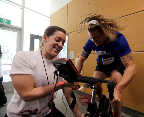 TREVOR HAGAN / WINNIPEG FREE PRESS
Kaitlin Kucharski, a technical team member, monitoring the progress of Kayden Johnson, one of 100 athletes from qualifying events in Saskatoon, Brandon and Winnipeg participated in the RBC Training Ground at the University of Winnipeg, Saturday, May 5, 2018.