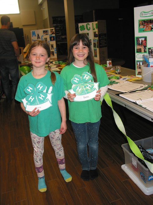 Canstar Community News April 28 - La Salle 4-H Club Cloverbud members Delia Cormier and Sadie Spicer participate in the club's achievement at the La Salle Community Fellowship on April 28. (ANDREA GEARY/CANSTAR COMMUNITY NEWS)