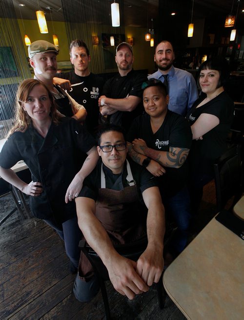 PHIL HOSSACK / WINNIPEG FREE PRESS - A group shot of a bunch of local chefs who will be taking part in an ongoing pop-up food series called HaCHere. Allan Pineda front centre came up with the idea he and the chef's hope will continue. Jill WIlson story.  - MAY 7, 2018.

**Jill Wilson will ID these guys and gals on the Merlin copies.