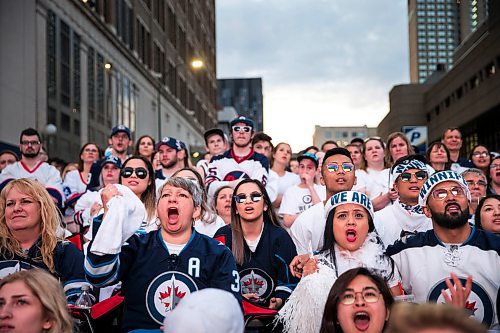 MIKAELA MACKENZIE / WINNIPEG FREE PRESS
Jets fans react to a tense game at the whiteout street party in Winnipeg on Monday, May 7, 2018. 
Mikaela MacKenzie / Winnipeg Free Press 2018.