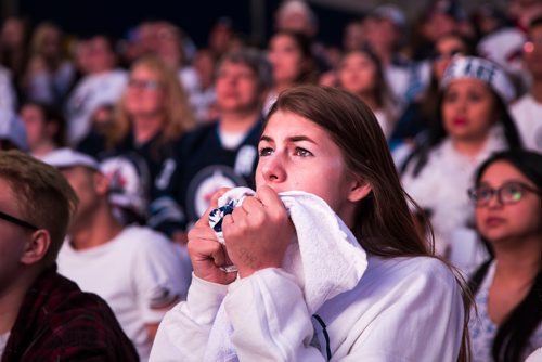 MIKAELA MACKENZIE / WINNIPEG FREE PRESS
Sharon Anderson reacts to a tense game at the whiteout street party in Winnipeg on Monday, May 7, 2018. 
Mikaela MacKenzie / Winnipeg Free Press 2018.