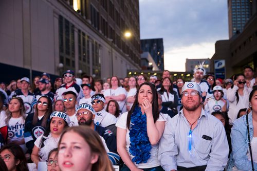 MIKAELA MACKENZIE / WINNIPEG FREE PRESS
Jets fans react to a tense game at the whiteout street party in Winnipeg on Monday, May 7, 2018. 
Mikaela MacKenzie / Winnipeg Free Press 2018.