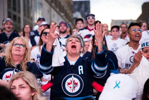 MIKAELA MACKENZIE / WINNIPEG FREE PRESS
Tina Quesnel reacts to a tense game at the whiteout street party in Winnipeg on Monday, May 7, 2018. 
Mikaela MacKenzie / Winnipeg Free Press 2018.