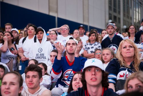 MIKAELA MACKENZIE / WINNIPEG FREE PRESS
Jets fans react to a tense game at the whiteout street party in Winnipeg on Monday, May 7, 2018. 
Mikaela MacKenzie / Winnipeg Free Press 2018.