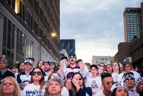 MIKAELA MACKENZIE / WINNIPEG FREE PRESS
Jets fans react to a tense game at the whiteout street party in Winnipeg on Monday, May 7, 2018. 
Mikaela MacKenzie / Winnipeg Free Press 2018.