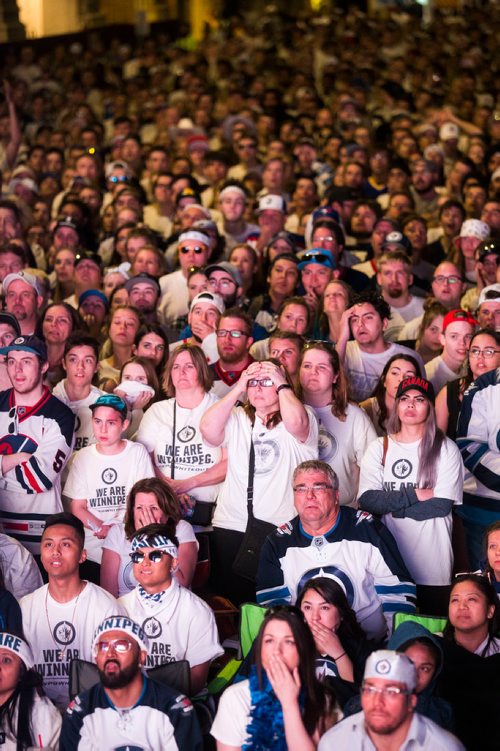 MIKAELA MACKENZIE / WINNIPEG FREE PRESS
Jets fans react to a tense game at the whiteout street party in Winnipeg on Monday, May 7, 2018. 
Mikaela MacKenzie / Winnipeg Free Press 2018.