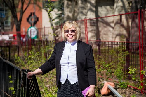 MIKAELA MACKENZIE / WINNIPEG FREE PRESS
Reverend Enid Pow of Holy Trinity Church poses for a portrait in front of the area where the public washroom will go in Winnipeg on Wednesday, May 9, 2018. Pow agreed to a public washroom on the downtown property, saying that it provides dignity to people who need it.
Mikaela MacKenzie / Winnipeg Free Press 2018.