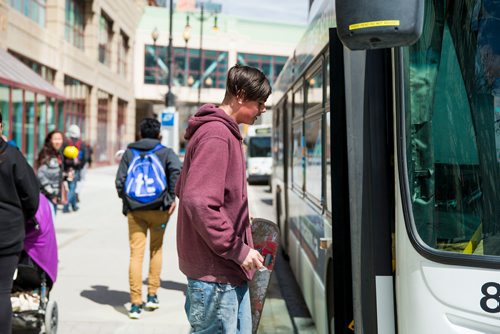 MIKAELA MACKENZIE / WINNIPEG FREE PRESS
Daniel Fraser boards a bus at Portage Place in Winnipeg on Wednesday, May 9, 2018. Fraser claims to have been recently robbed at the bus stop shelter.
Mikaela MacKenzie / Winnipeg Free Press 2018. 
Winnipeg transit