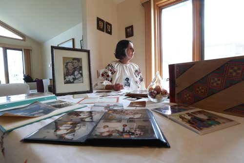 RUTH BONNEVILLE / WINNIPEG FREE PRESS

Passages feature on Olena Hryn.

Photo of Hher daughter, Mariika Hryn, with photos and memorabilia on table in her St. Vital home.   

Olena Hryn witnessed some of the most harrowing ordeals of the 20th century. 
Olena survived both the Soviet and Nazi occupations of her Ukrainian homeland, the Holodomor and the break-up of her family. Her father was a cleric forced into hiding. Her mother had to leave her in the care of relatives the worst winter of the famine--- in order to avoid being dragooned into Russian brigands that raided Ukrainian farms for their grain stores.
After the Second World War she as a refugee in a displaced persons camp. The Allies opened up local universities to  refugees and  Olena was finishing up her medical degree at a German university when she suddenly got a shot to come to Canada.


See Alex Paul story

May 10,  2018

